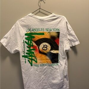 Stussy White Tee with Green Logo and Multi-Color Billiard Graphic